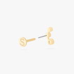 This is an image of a 14k gold flatback stud with 3 clear cz bezels in a cluster shape. color:null|14k gold/clear