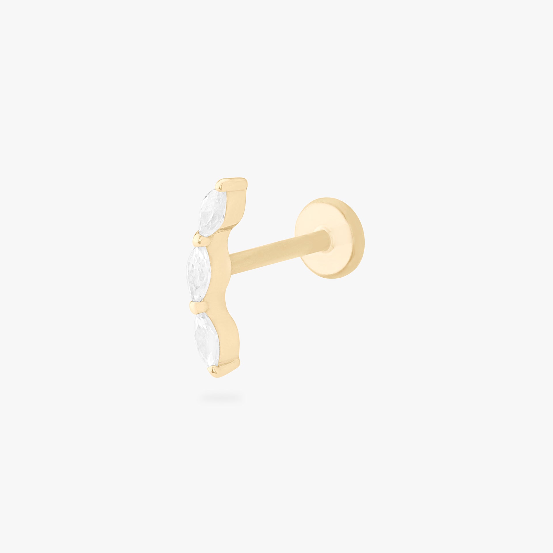 This is an image of a 14k gold flatback stud with 3 clear, pear-shaped cz's in a curved line. color:null|14k gold/clear