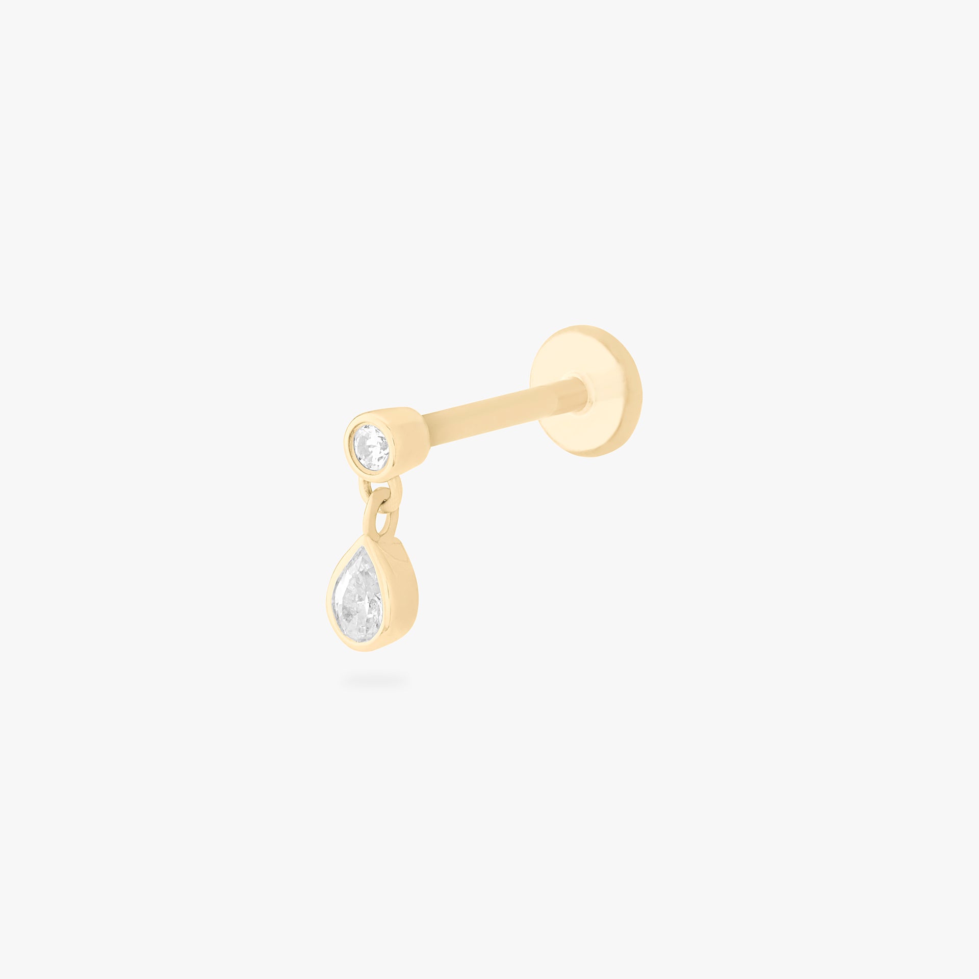 This is an image of a 14k gold flatback with a pear-shaped, bezel set clear cz stone dangling from another pear-shaped, bezel set clear cz stone. color:null|14k gold/clear