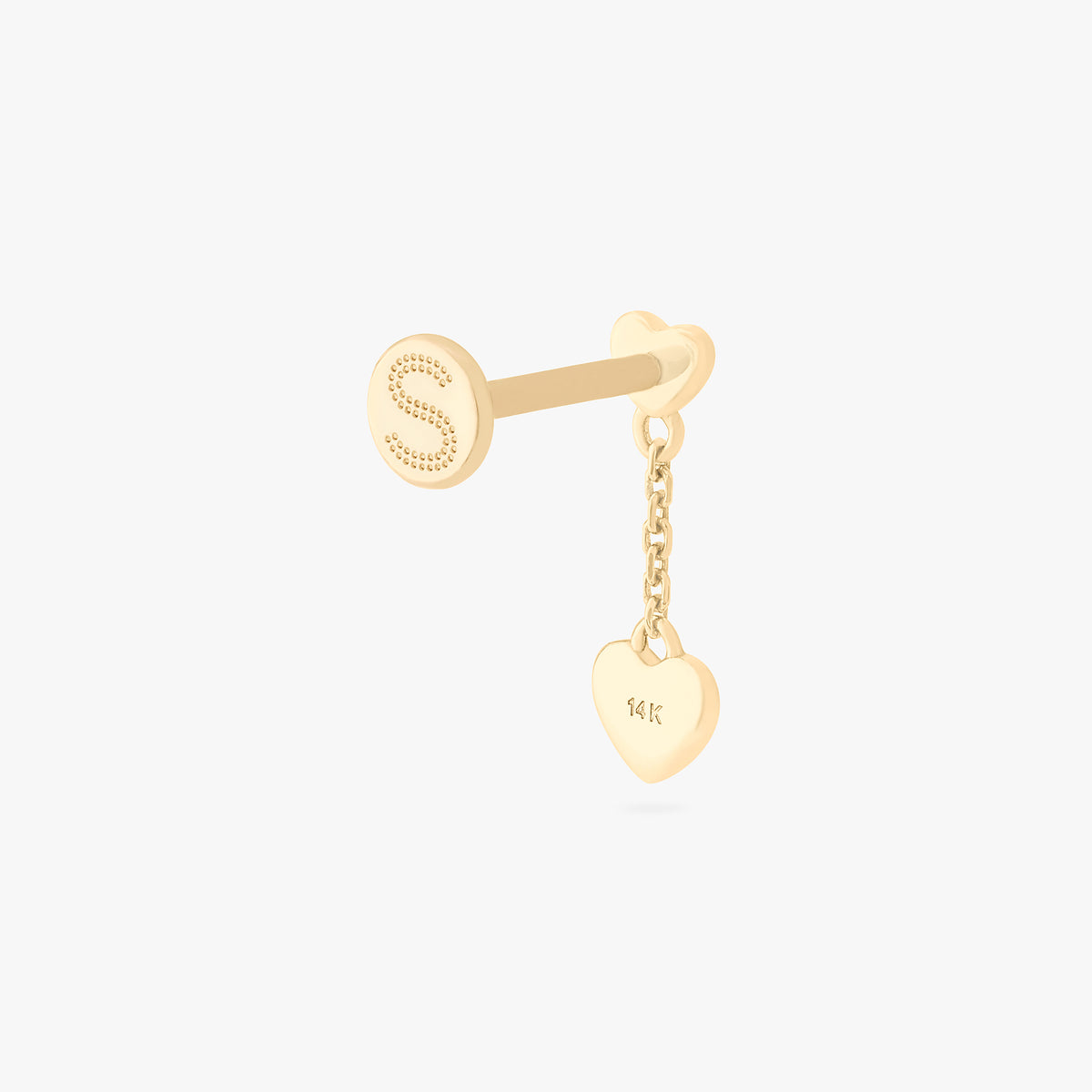 This is an image of a 14k gold flatback that is heart shaped with a gold shaped heart dangling from it. color:null|14k gold/clear