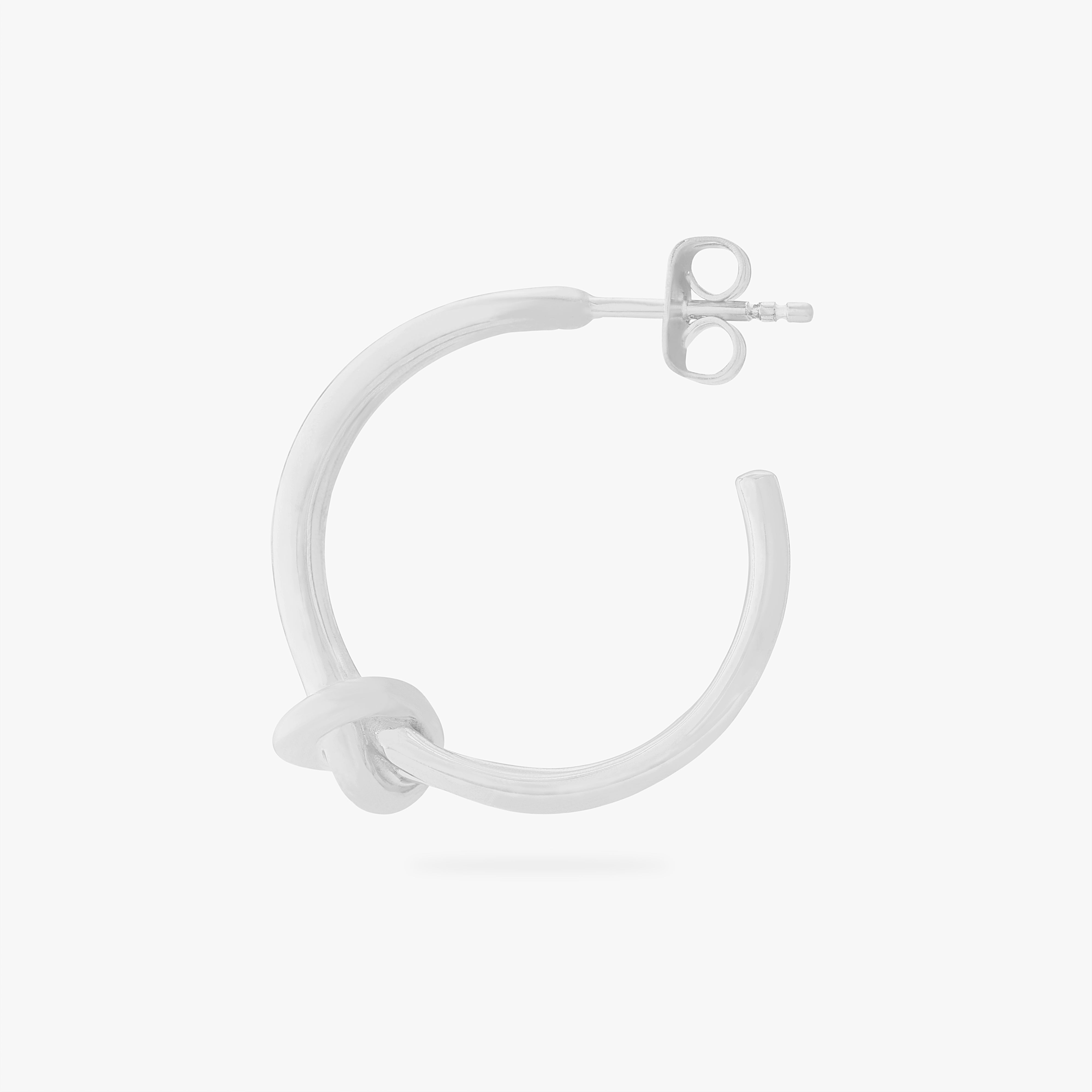 This is an image of a silver hoop butterfly back earring with a knot detail in the front. color:null|silver