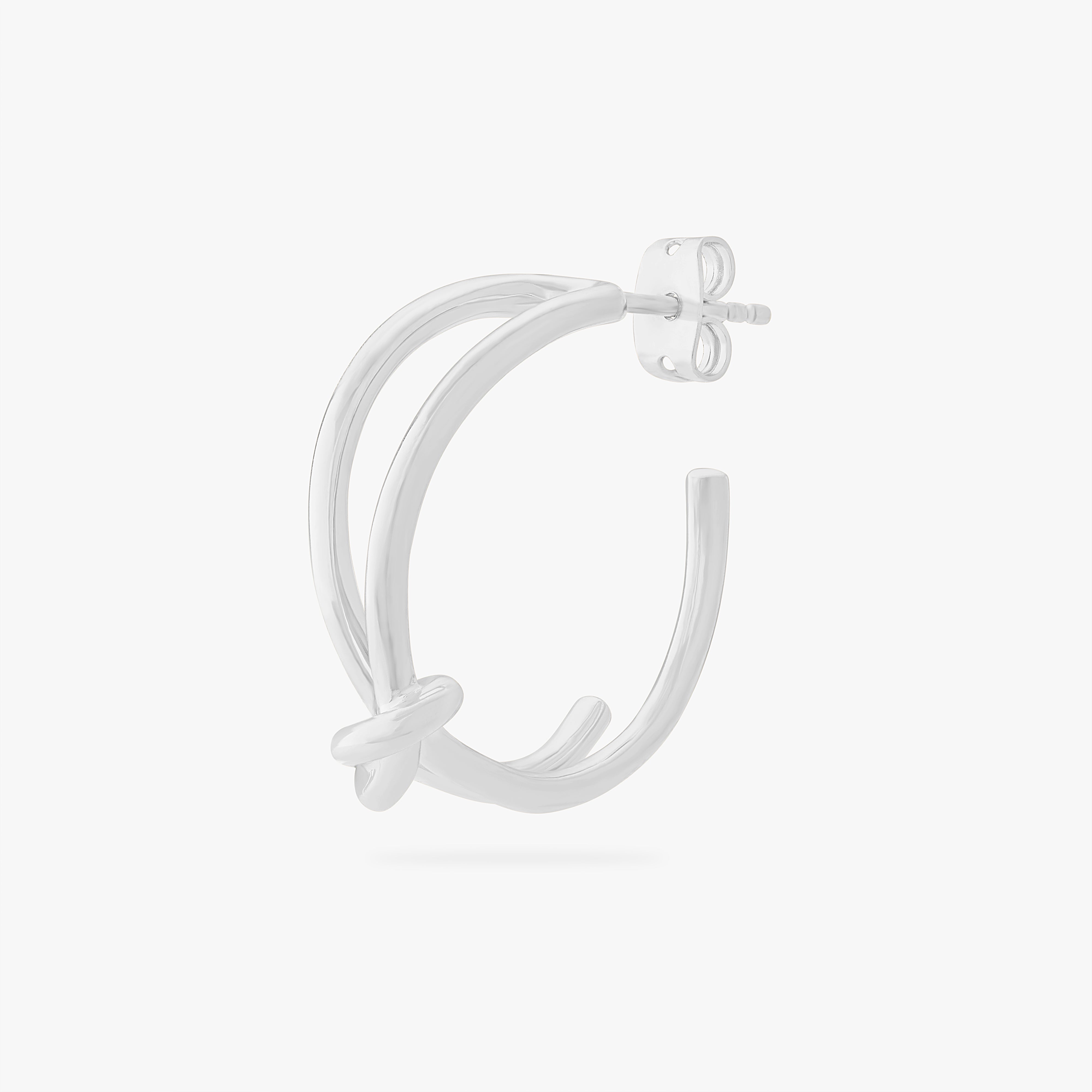 This is an image of a silver hoop butterfly back earring with a knot detail in the front. color:null|silver