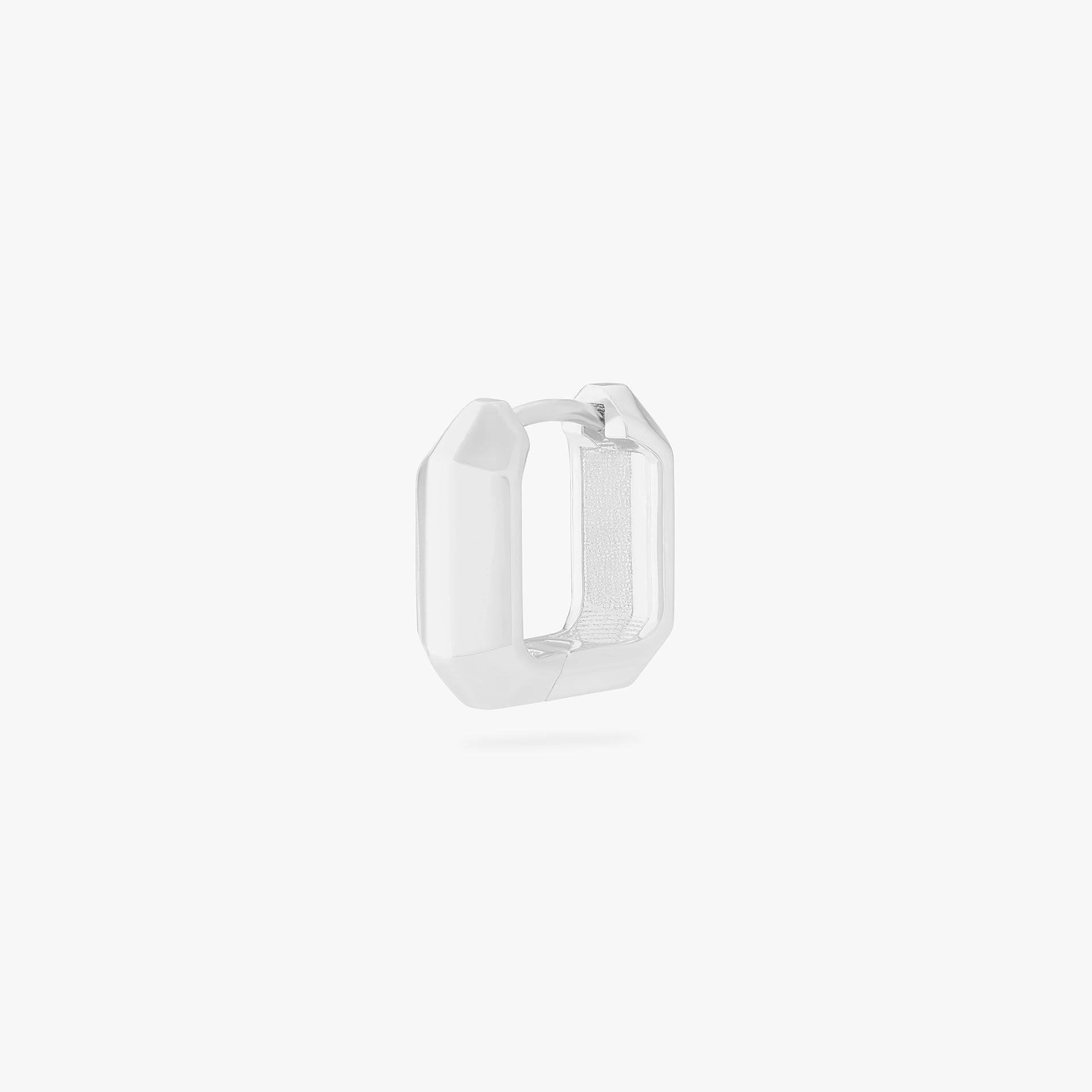 This is an image of a silver toned huggie that is square shaped. - Main view