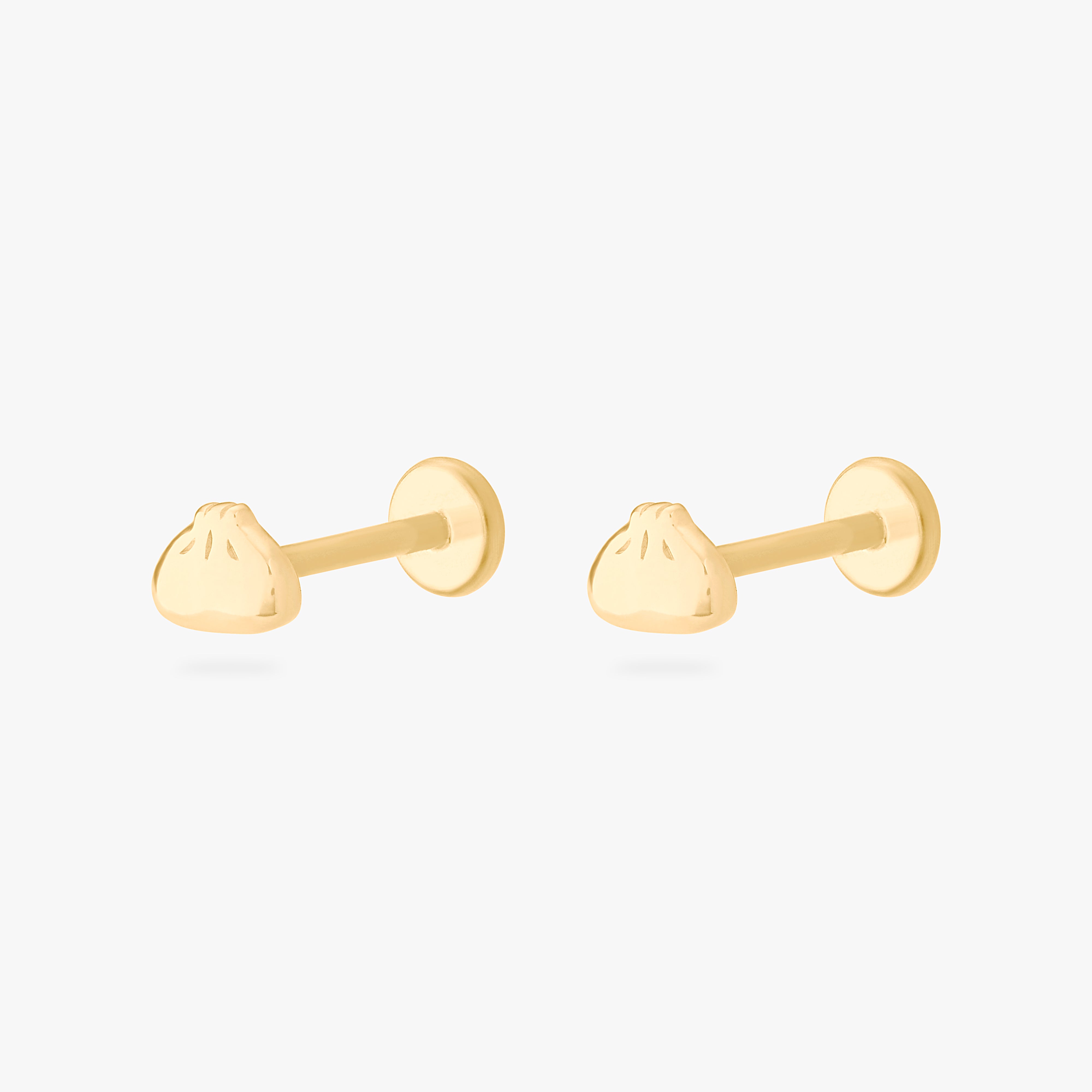 collaboration collection between DTF x Studs featuring a flatback with a xiao long bao in gold [pair] color:null|gold