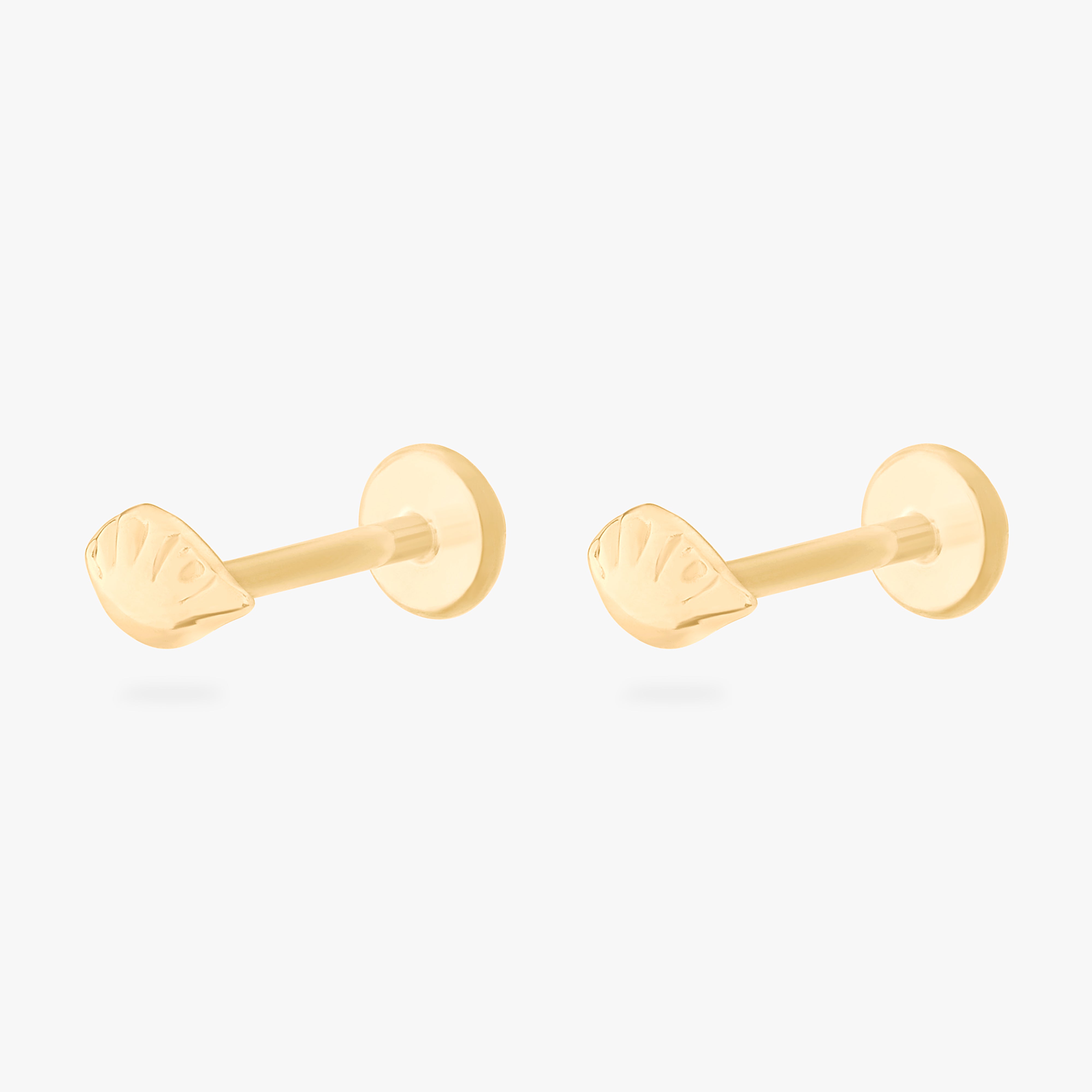 collaboration collection between DTF x Studs featuring a flatback with a steamed dumpling in gold [pair] color:null|gold