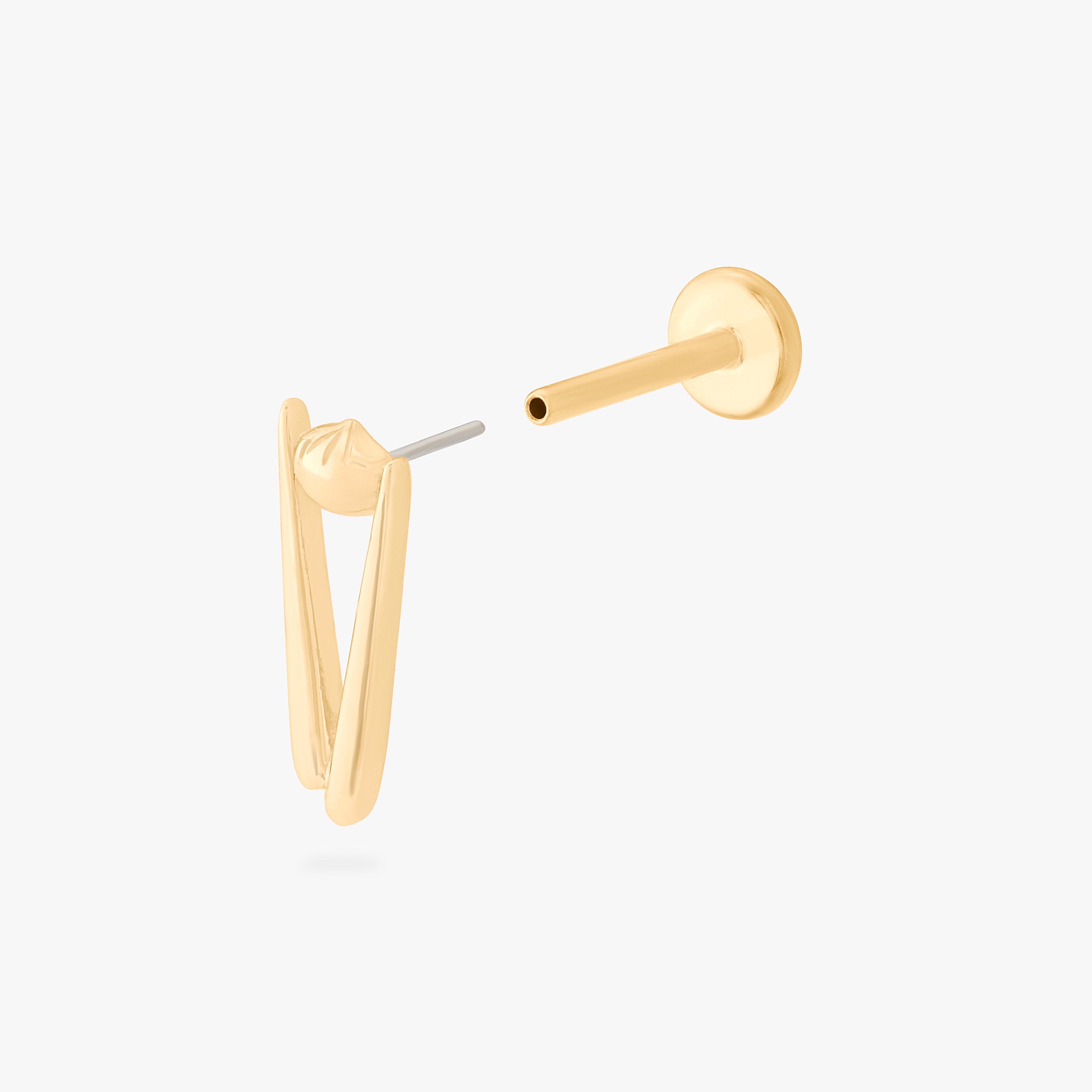 collaboration collection between DTF x Studs featuring a flatback with a pair of chopsticks holding a dumpling in gold color:null|gold