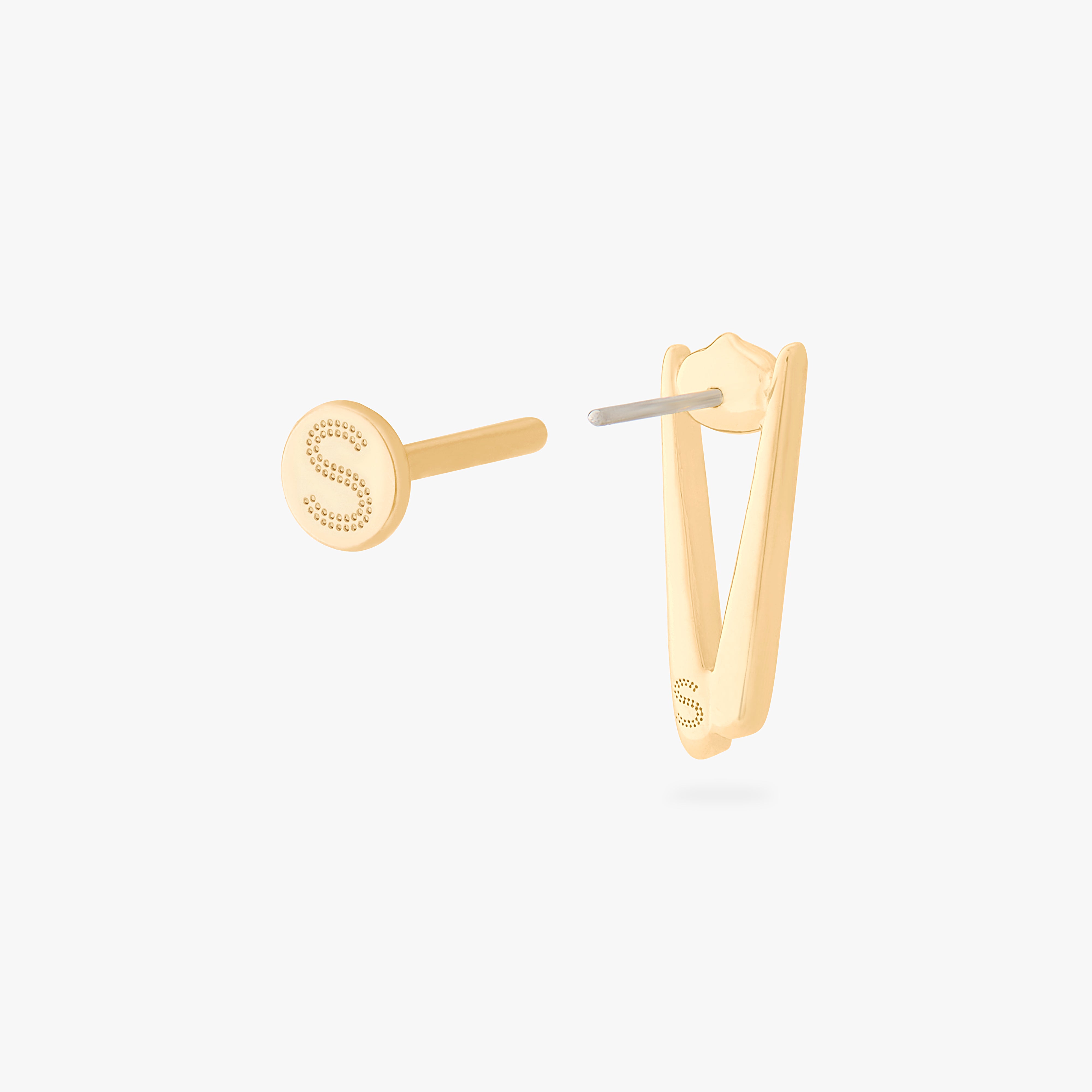 collaboration collection between DTF x Studs featuring a flatback with a pair of chopsticks holding a dumpling in gold color:null|gold