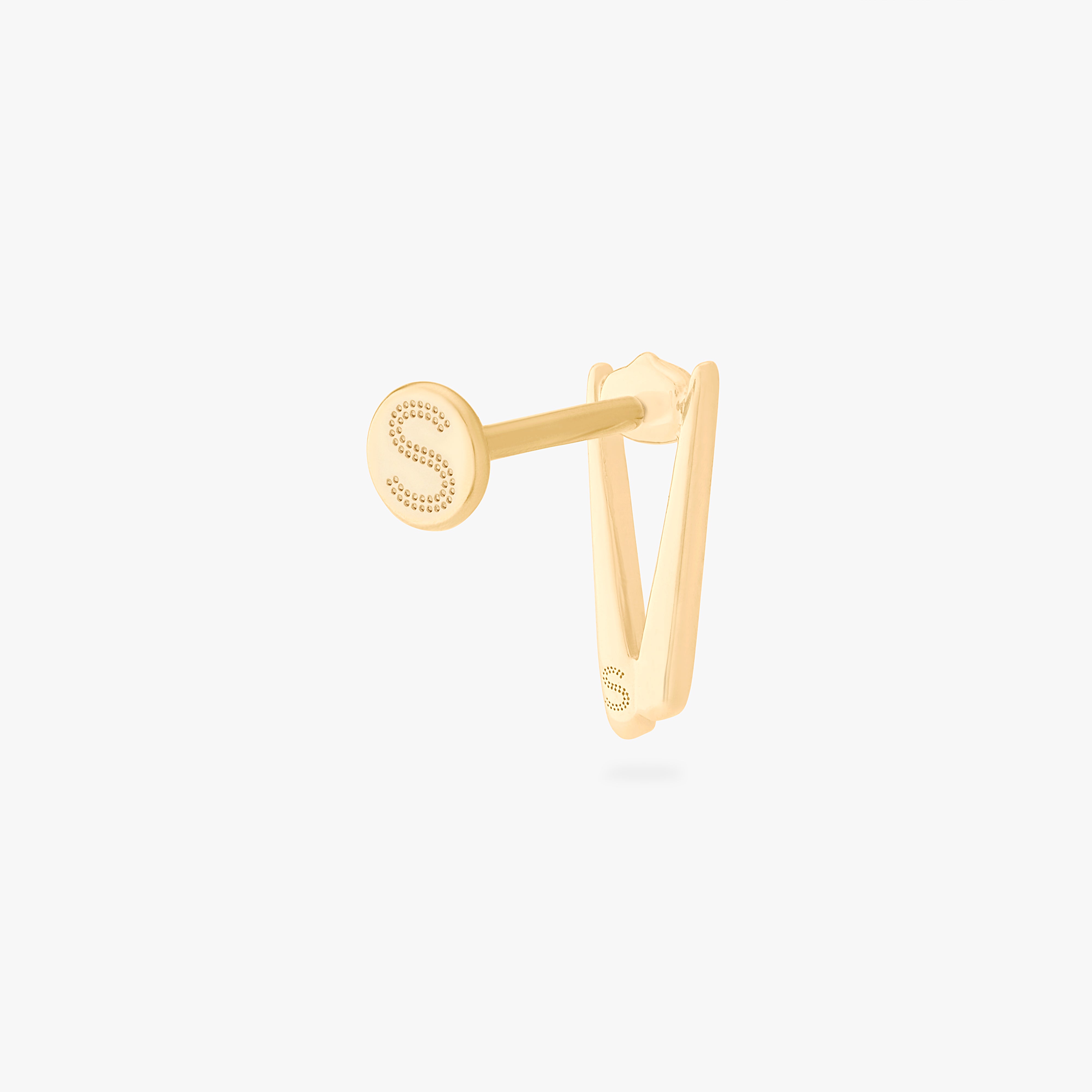 collaboration collection between DTF x Studs featuring a flatback with a pair of chopsticks holding a dumpling in gold color:null|gold