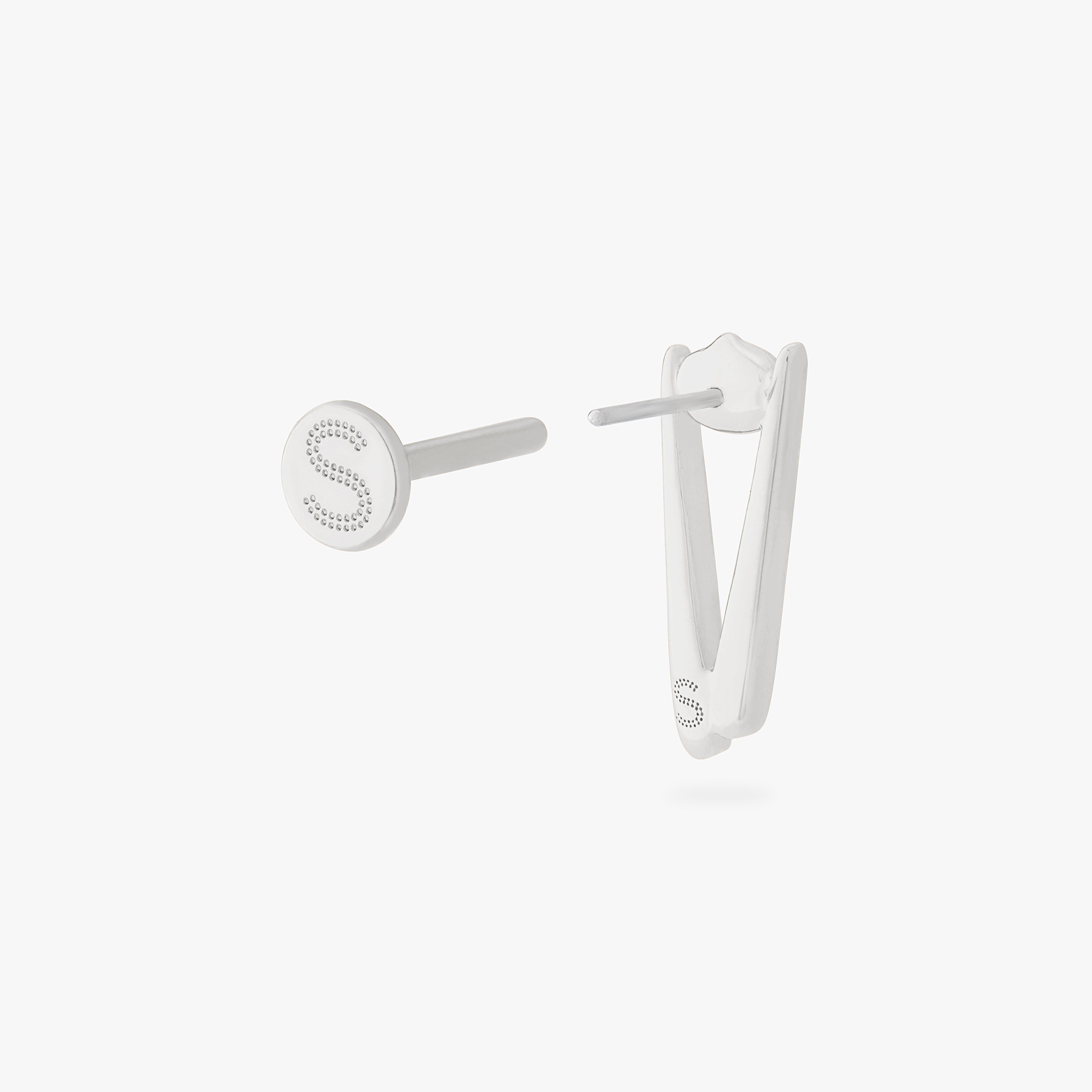 collaboration collection between DTF x Studs featuring a flatback with a pair of chopsticks holding a dumpling in silver color:null|silver