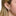 This is an image of a two-toned gold and silver huggie that is chunky and crescent shaped. [hover] color:null|gold/silver