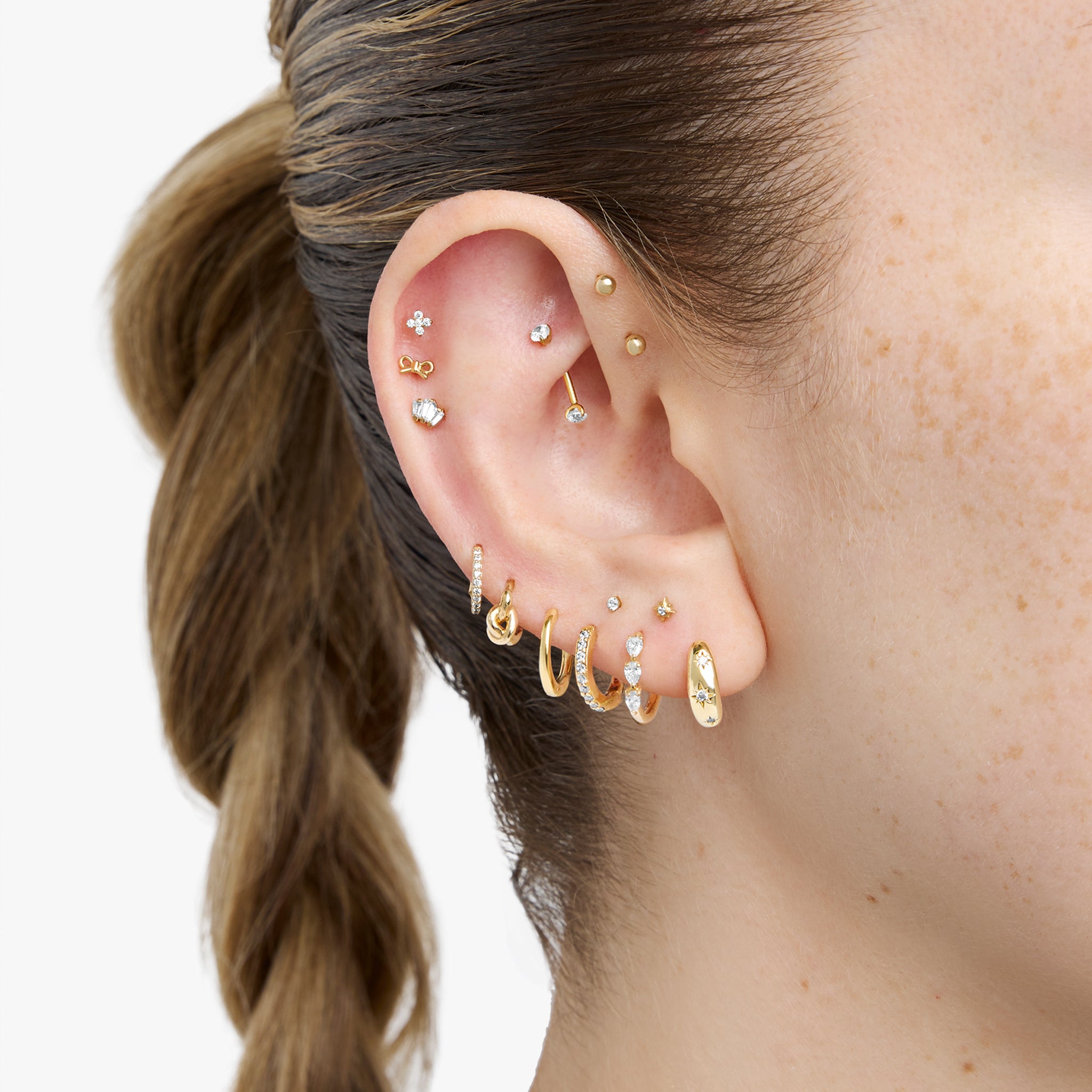 earscape featuring the 8mm threadless gold barbell earring with cz ends [hover] color:null|gold/clear