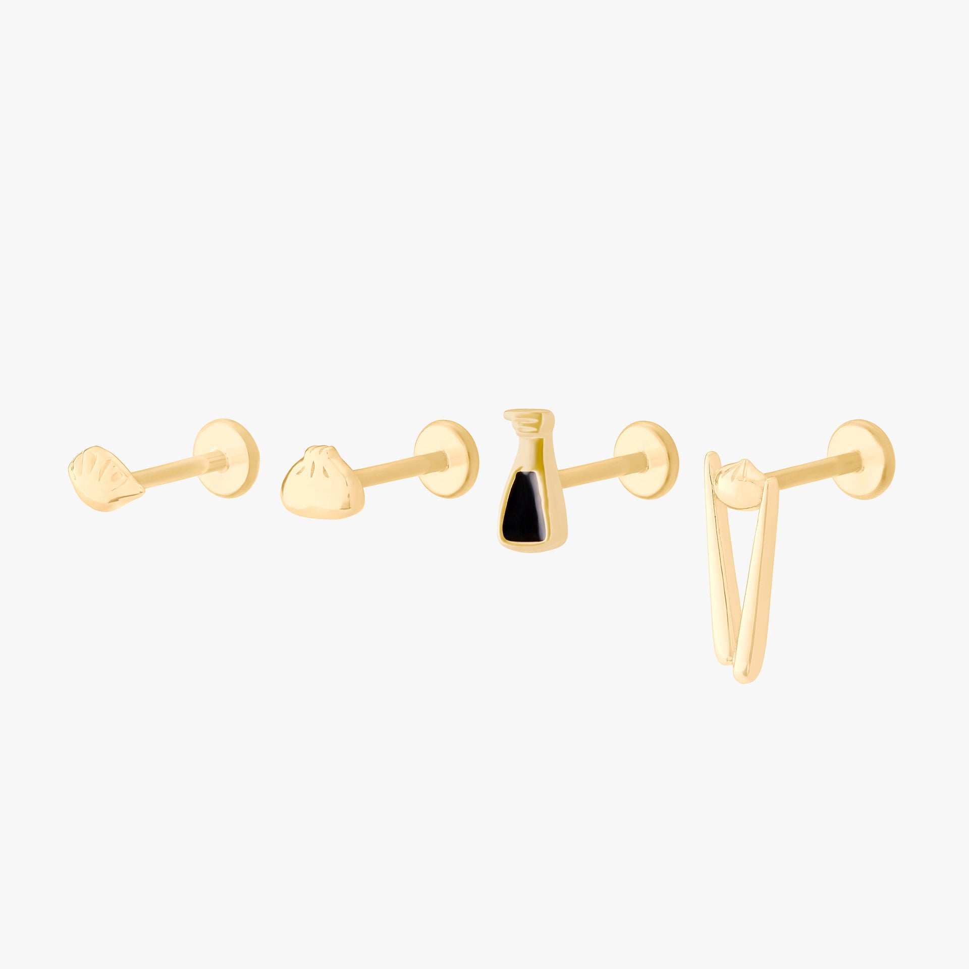 set of flatback earrings from the studs x din tai fung collection in gold - Main view