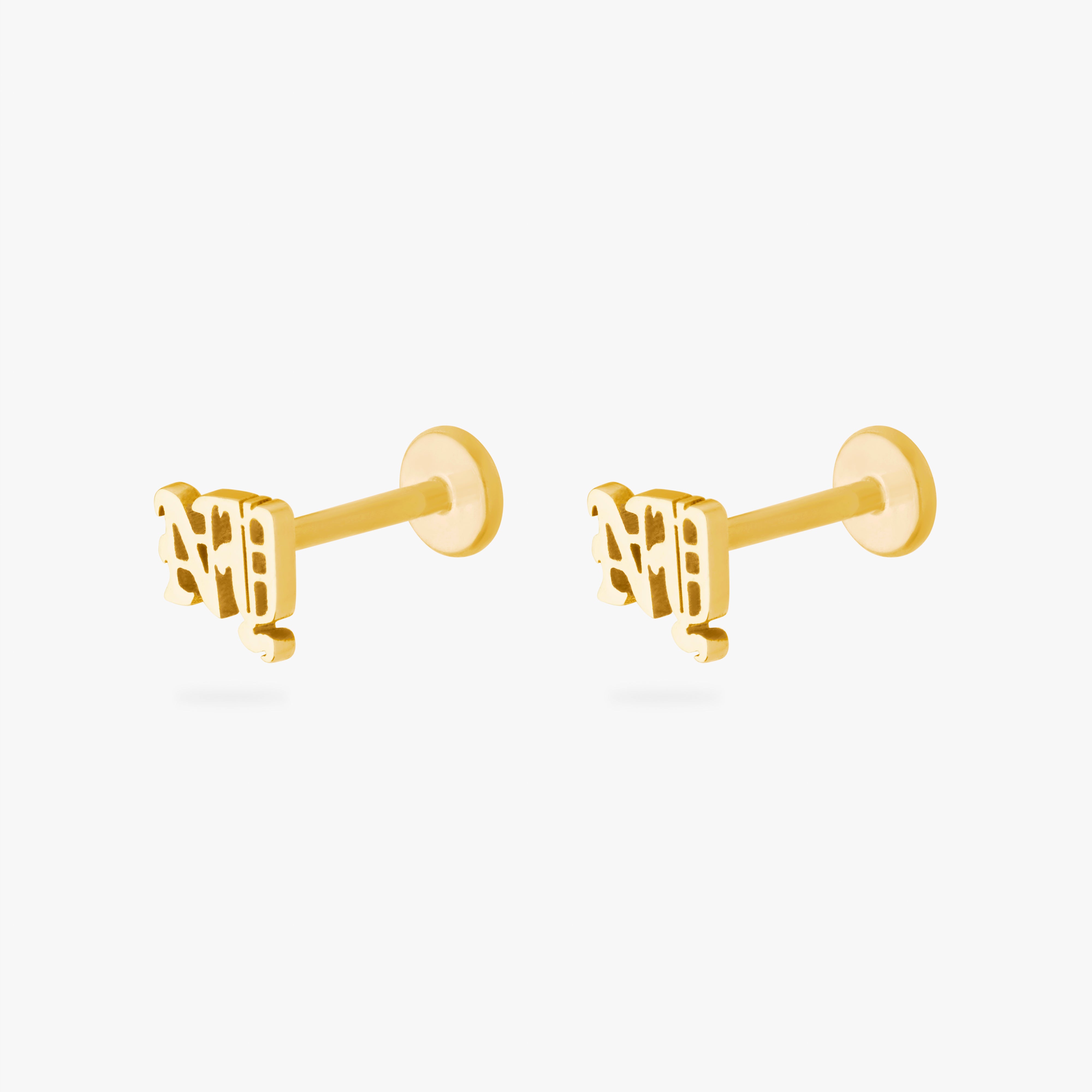 pair of flatback studs that spells NY in gothic font in gold [pair] color:null|gold