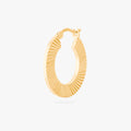This is an image of a 14K gold plated hoop that has a fluted, shell-like finish. 