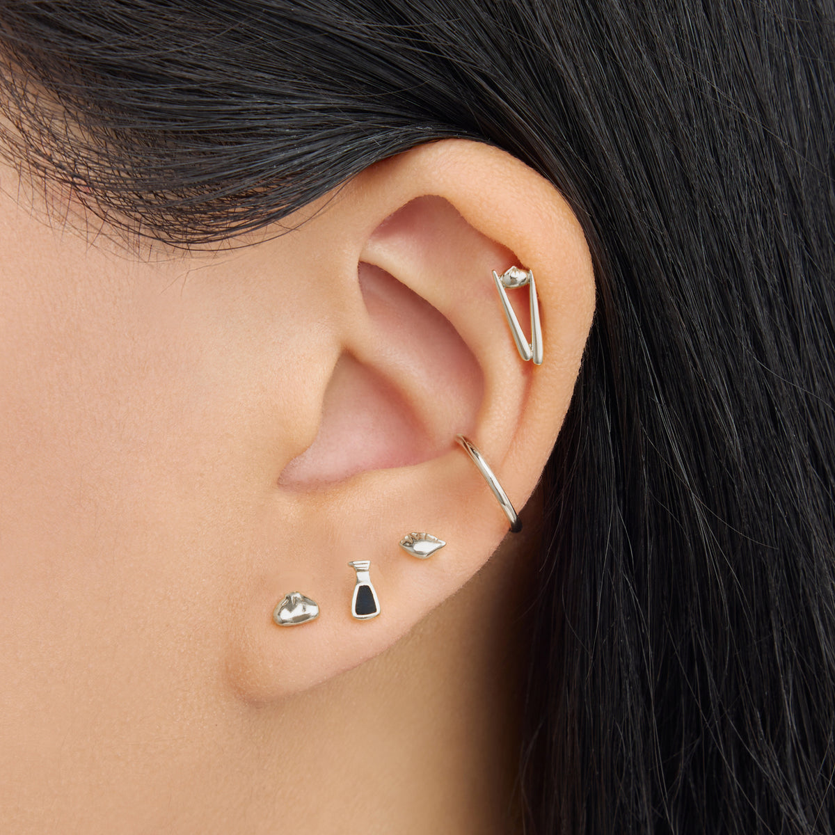 set of flatback earrings from the studs x din tai fung collection in gold [hover] color:null|silver
