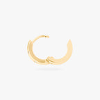 This image displays a 14K gold plated chunky huggie that features twinkle star shaped engravings with crystal CZ stones throughout the huggie against a white background. This image displays the huggie hinged open. 