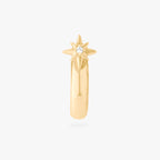 This is an image of a 14K gold plated stud with a twinkle star with a crystal CZ that is shaped like a hoop against a white background.