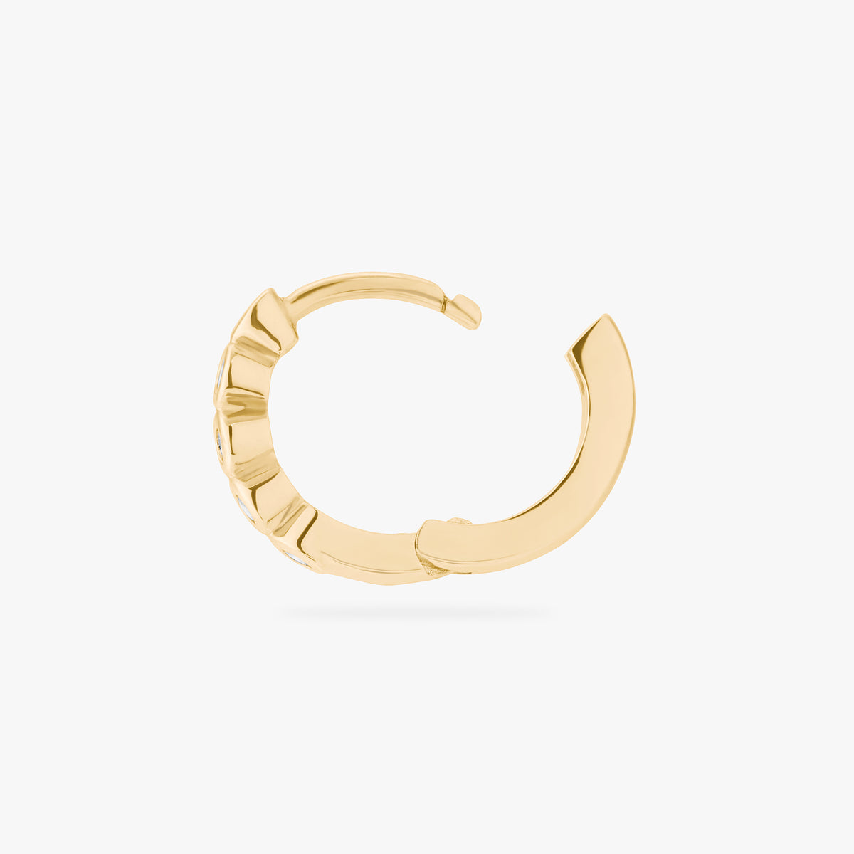 Gold hoop earring side view with open clasp