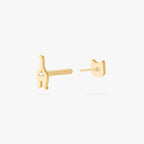 Gold cat-shaped earrings on a white background