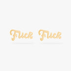Two gold stud earrings on a white background