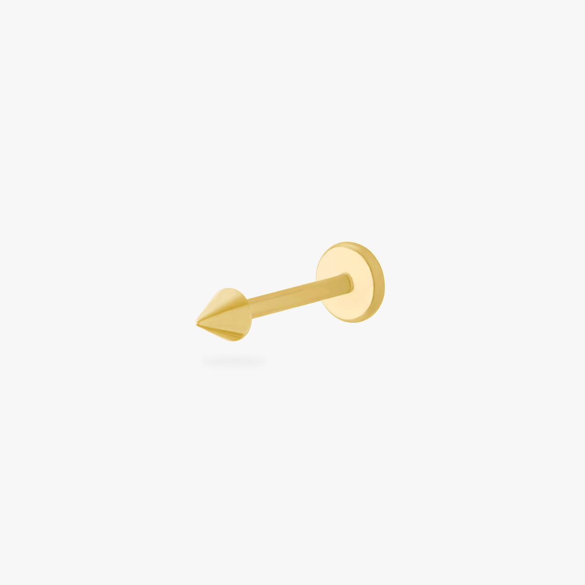 This is an image of a gold-toned titanium flatback stud that is shaped like a spike. 