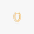 This is an image of a 14K gold plated huggie earring with 6 baguette cut, bezel set crystal CZs along the edge. 
