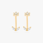 This is an image of a pair of gold-toned titanium curved barbells with crystal CZs in the shape of flowers on one end of each bar, and crystal CZs in the shape of leaves on the other end of each bar. 