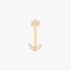 This is an image of a gold-toned titanium curved barbell with crystal CZs in the shape of a flower on one end of the bar, and crystal CZs in the shape of leaves on the other end of the bar. 