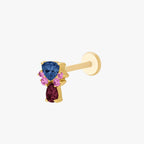 This image show the side view of the anodized triangle crown flatback. the flatback has a blue cz stone on the top, a pear red cz stone on the bottom and four  pink cz circular stones on each side of the earring. 