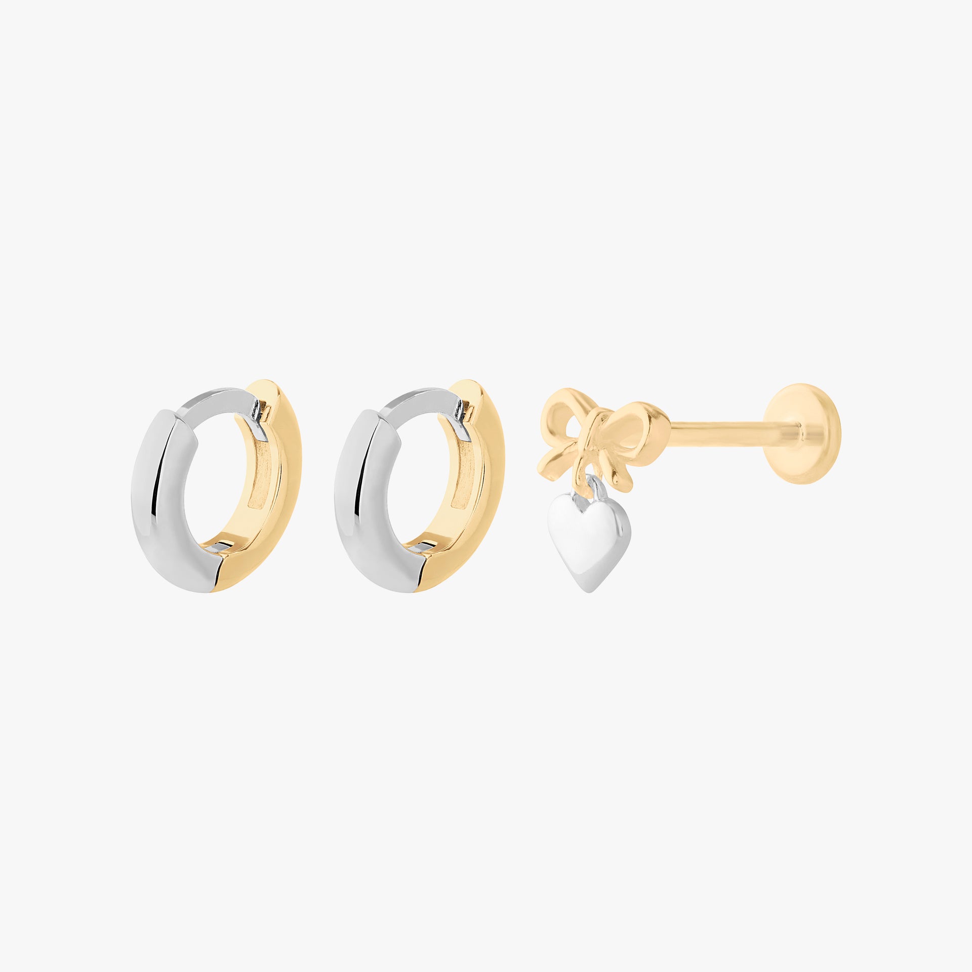 This is an image of the two tone starter set, which includes two Reverse Micro Two Tone Huggies and one Two Tone Bow Flatback Stud.