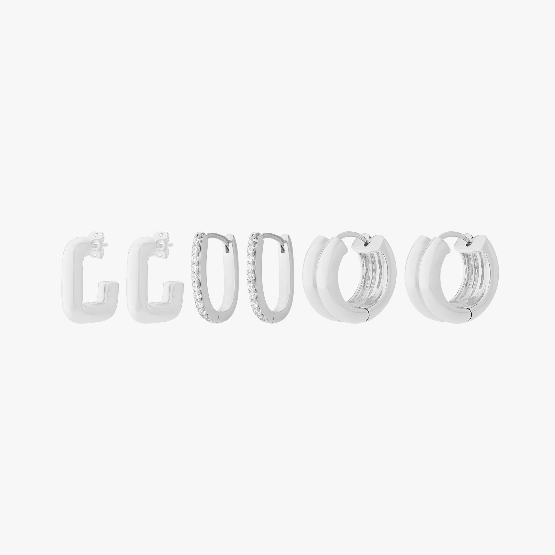 Ultimate Hoop Set featuring 3 pairs of silver hoops - the Chunky Square Hoop, the Pave Oval, and the Chunky Ridge. - Main view