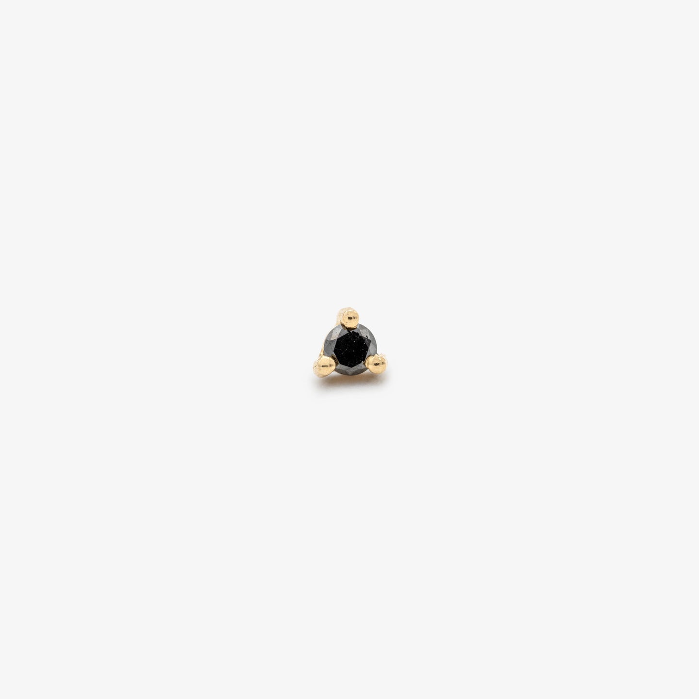 This is a small 14k gold stud with a black diamond that measures 2.5mm color:null|gold/black