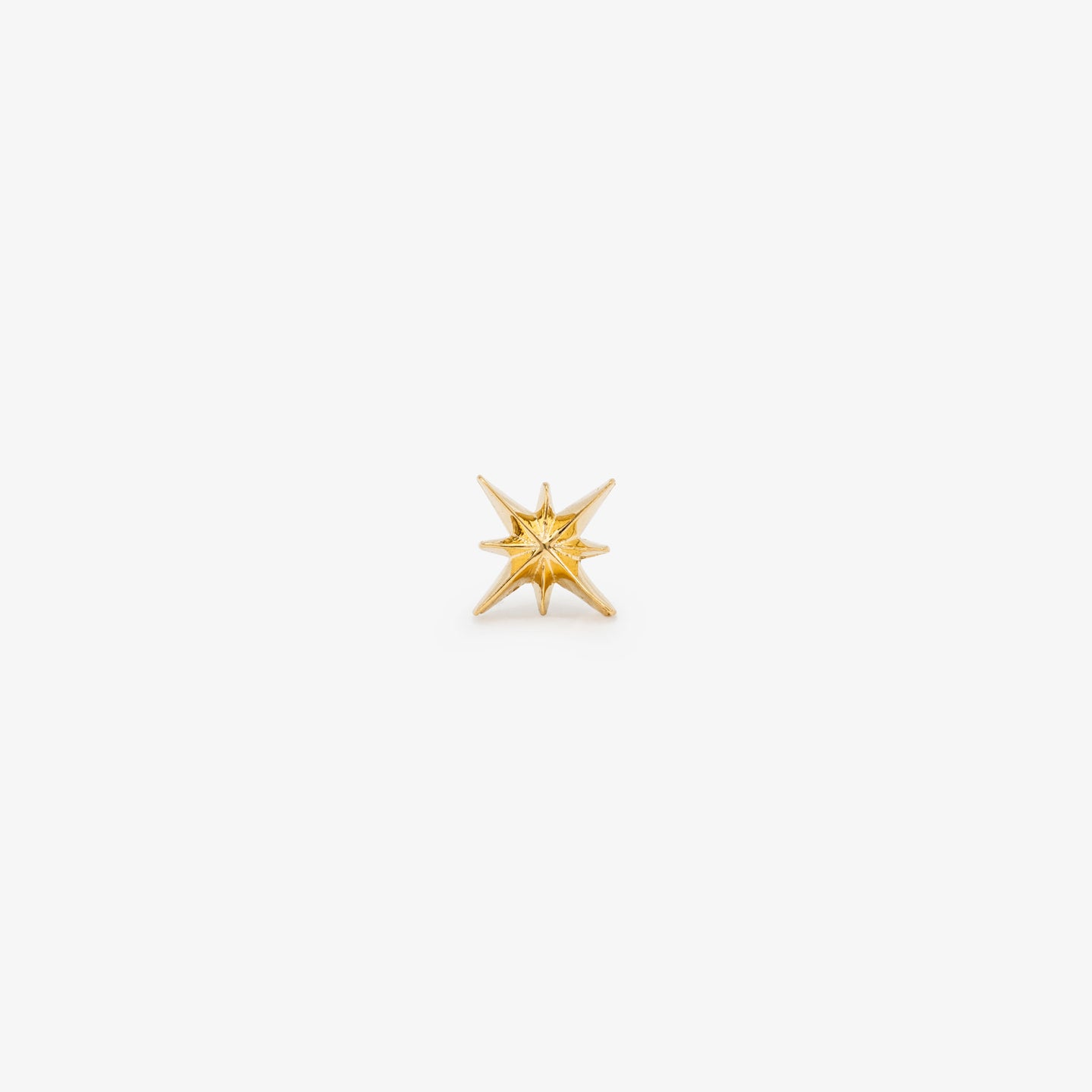 This is an 18k gold stud in the shape of a starburst color:null|18k gold
