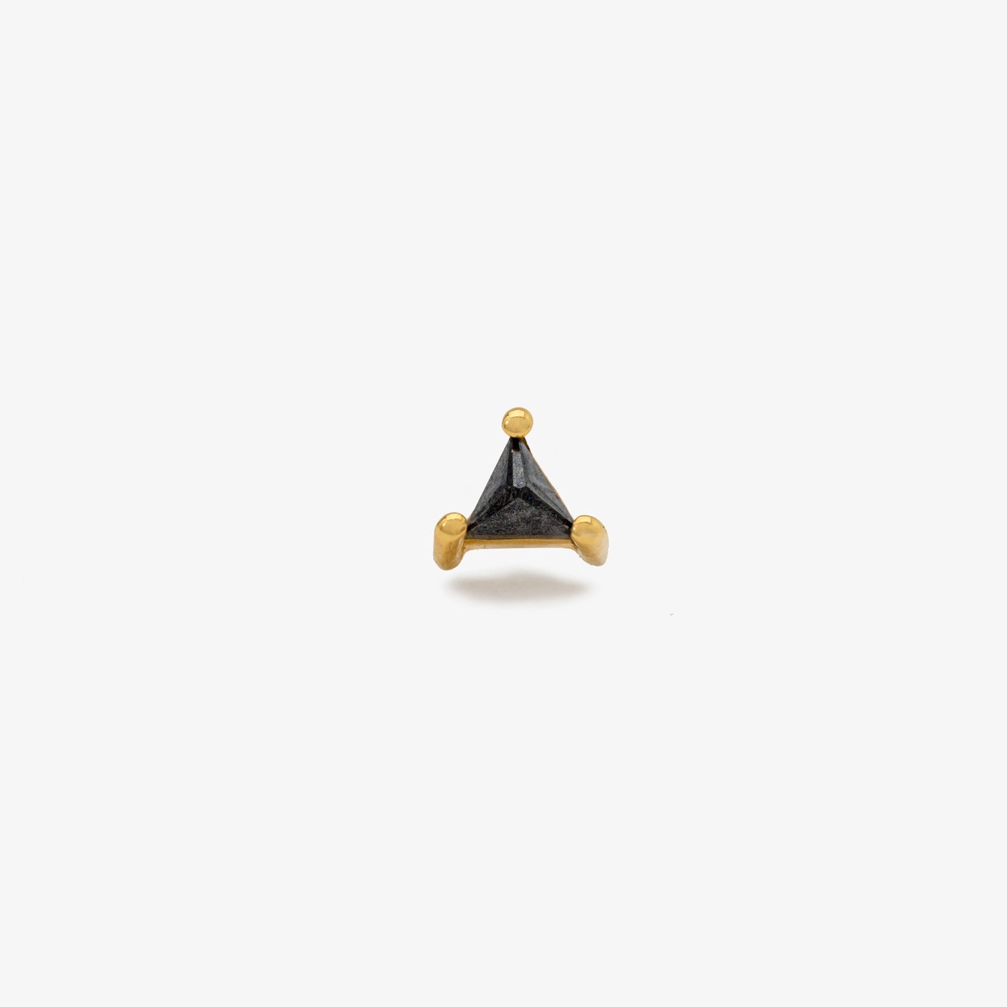 This is a small 18k gold stud with a triangle-cut black diamond color:18k gold/black diamond