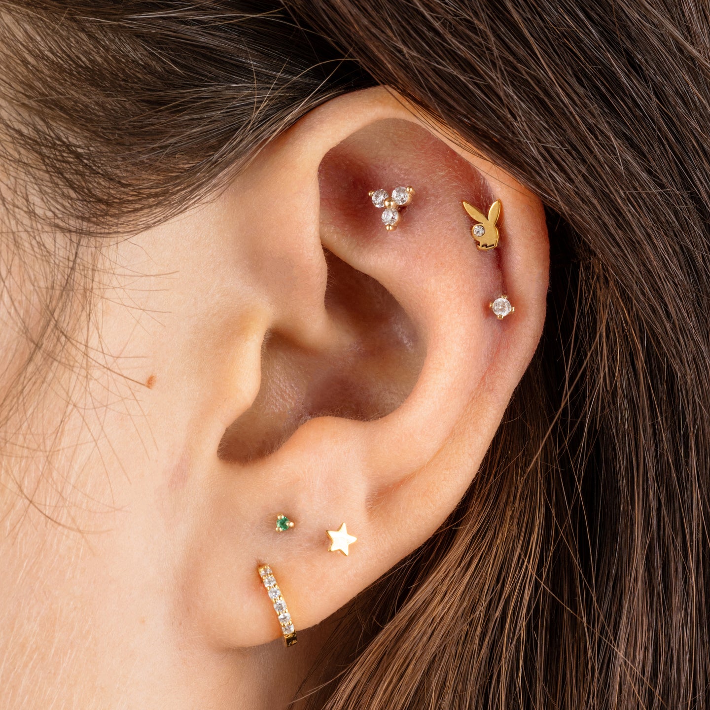 This is a 14k gold stud with pavé in the shape of a cluster color:null|14k gold/clear