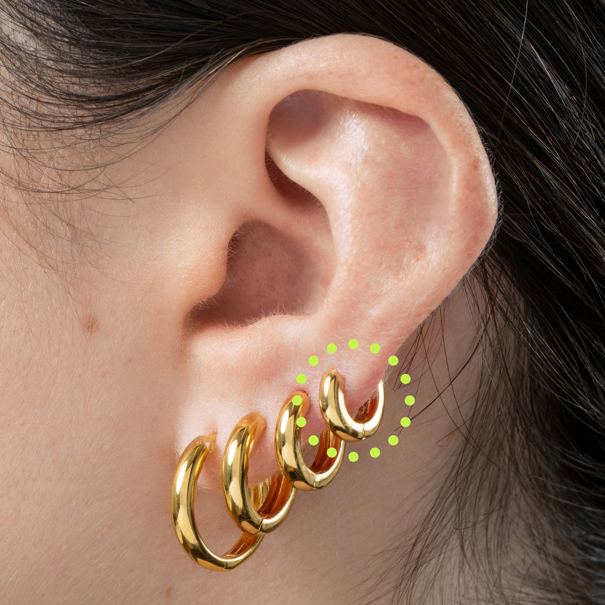 Micro sized chunky gold huggie. [hover] color:null|gold