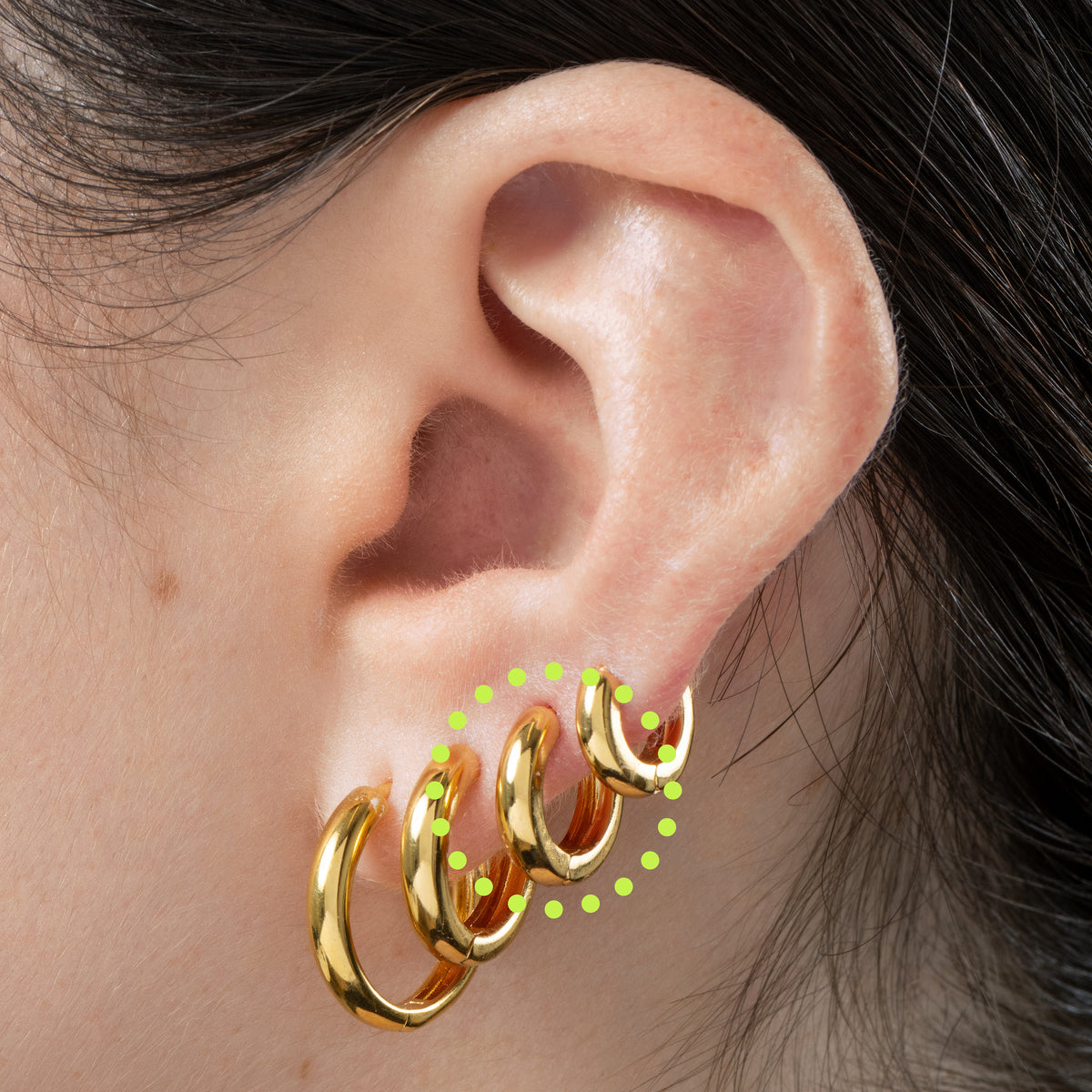 Mini sized chunky gold huggie. [hover] color:null|gold