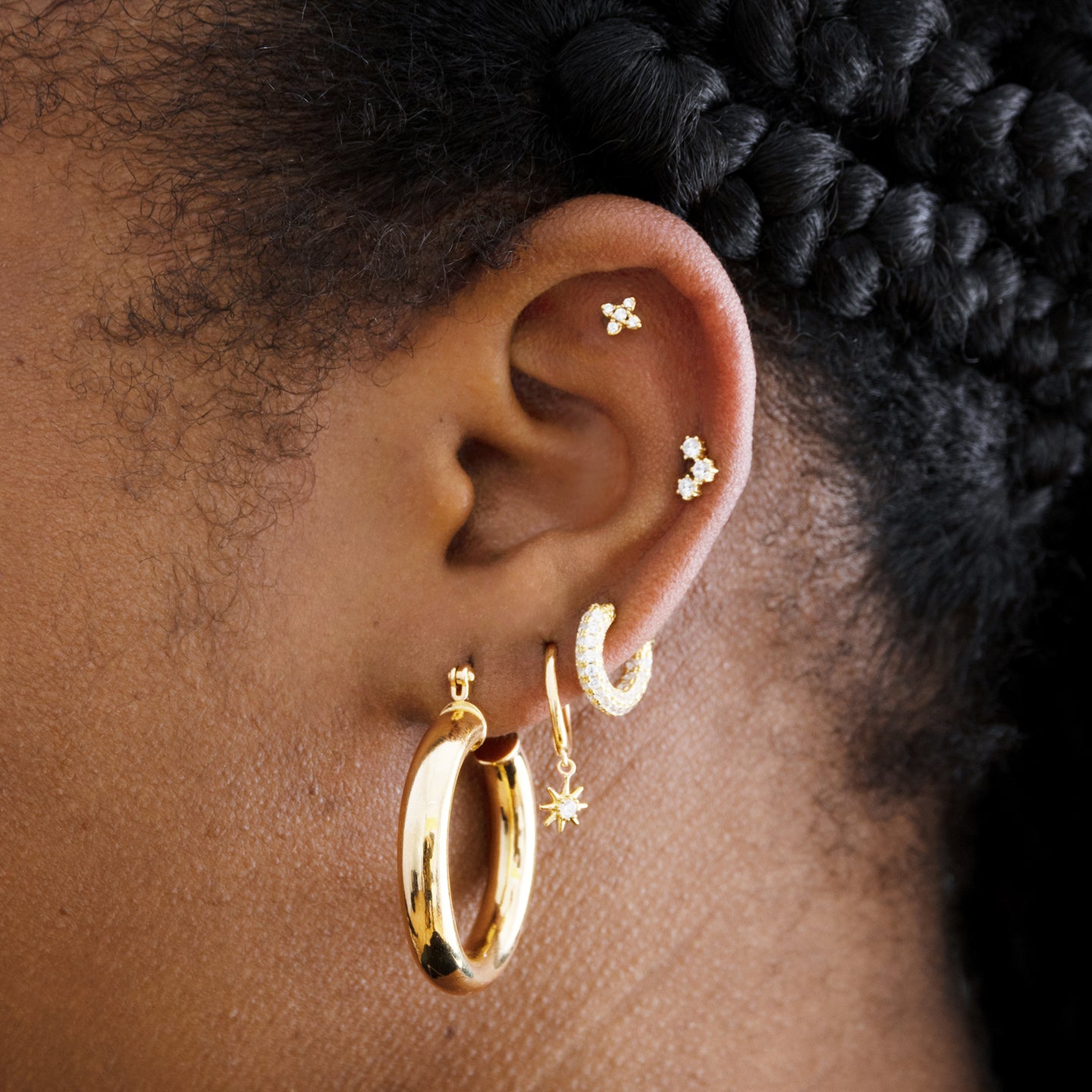 This is a large gold hoop earring [hover] color:null|gold
