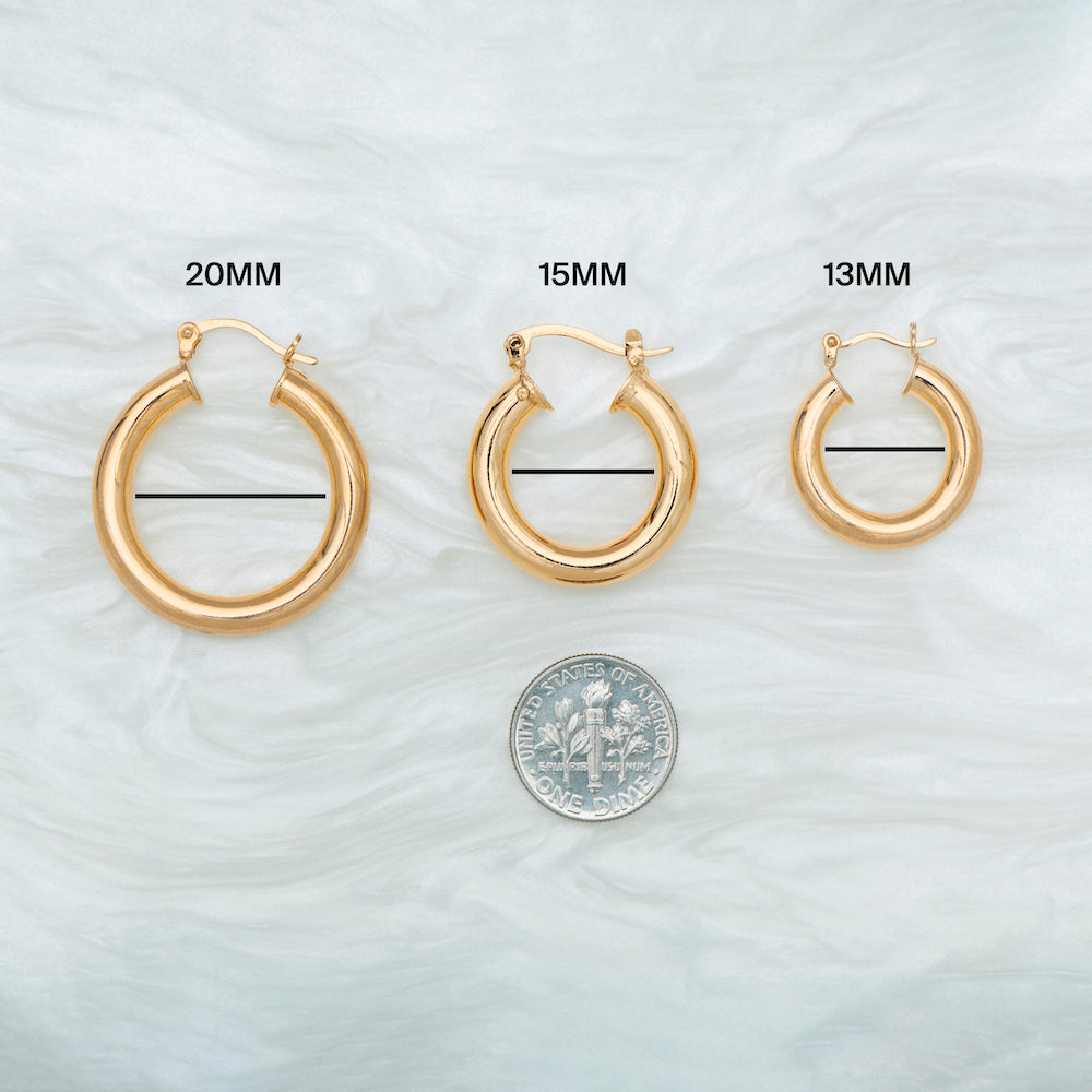 This is a medium gold hoop that measures 15mm [hover] color:null|gold