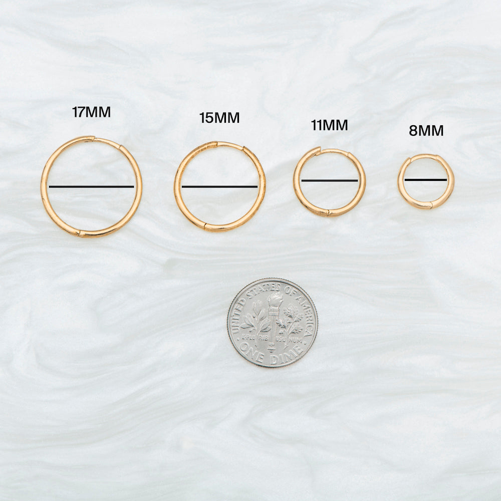 This is a small gold hoop that measures 11mm [hover] color:null|gold