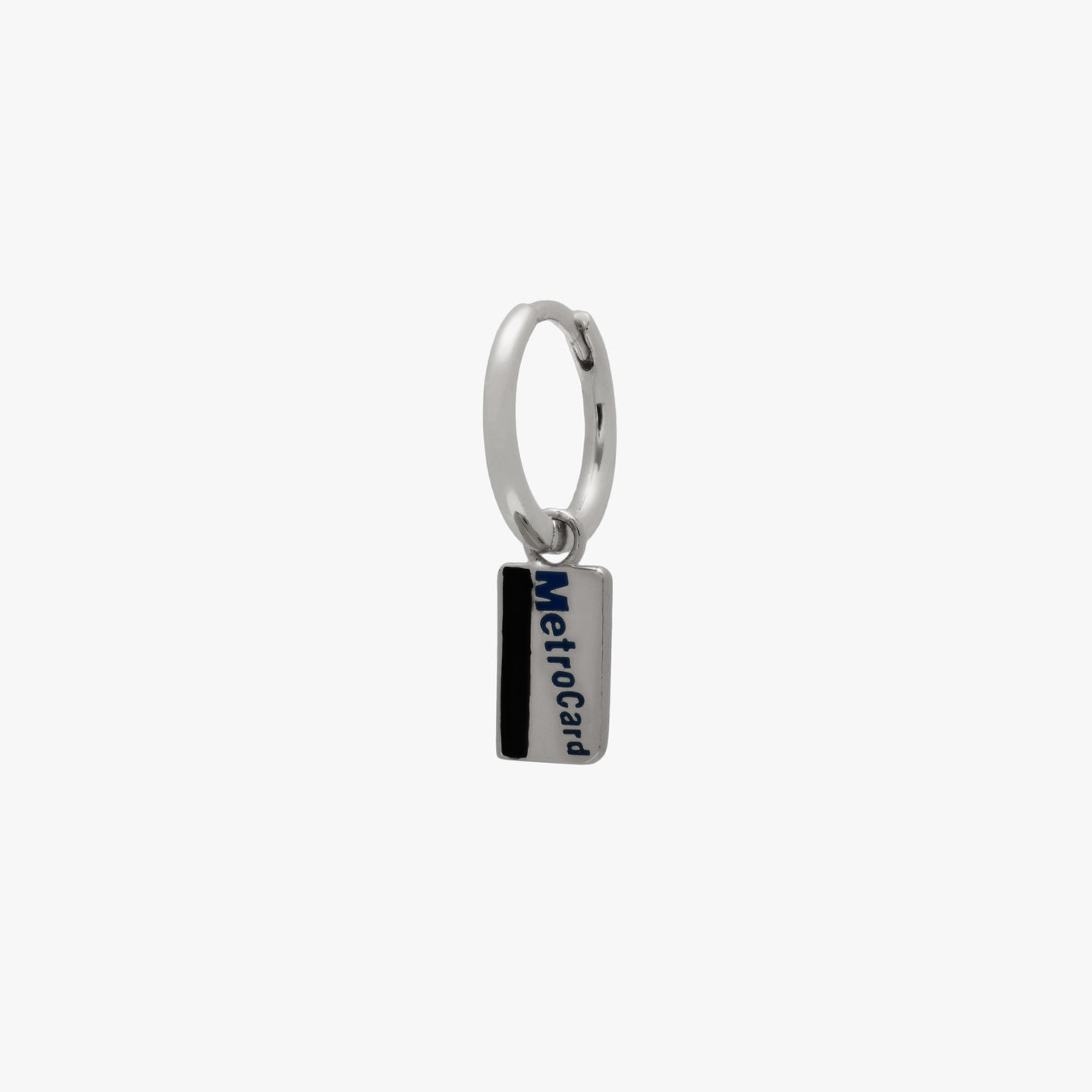 A silver metro card charm huggie color:null|silver