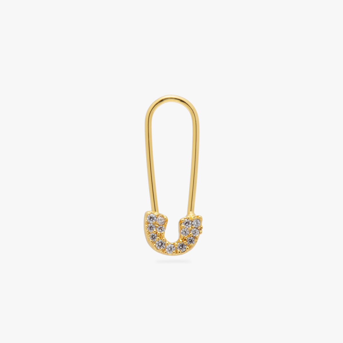 A gold plated pave safety pin shaped earring with clear cz stones 