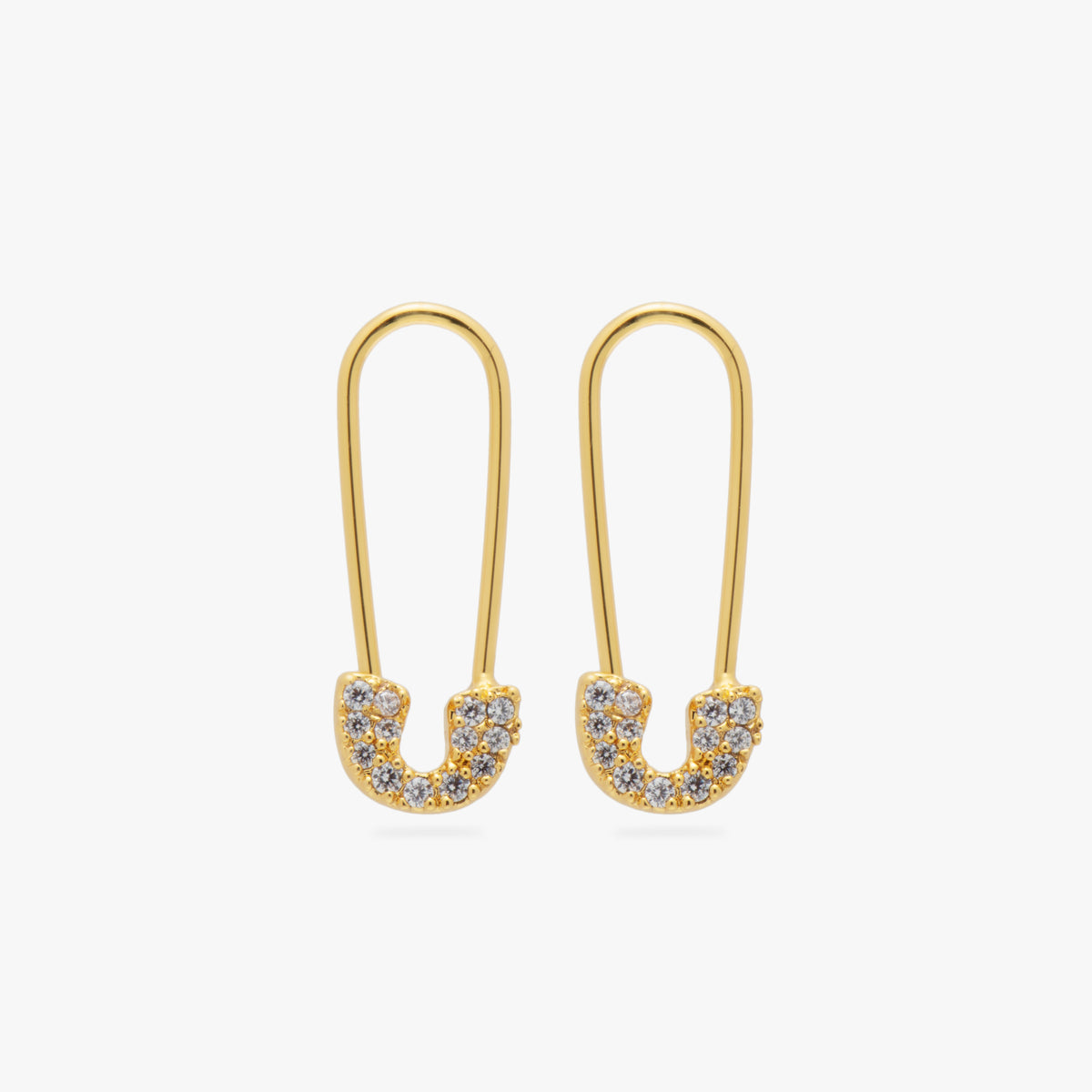 A piar of gold plated pave safety pin shaped earrings with clear cz stones 