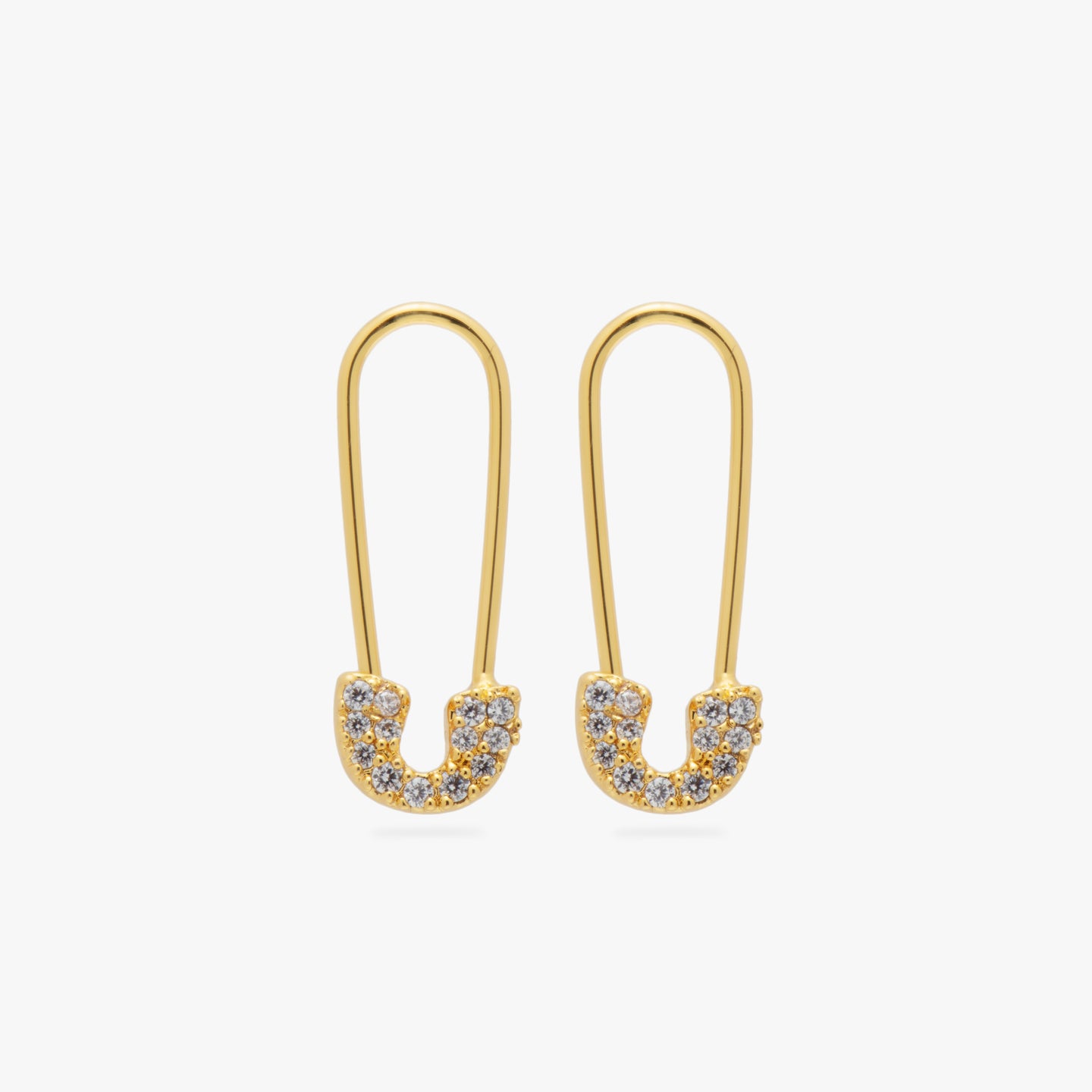 A pair of gold/clear pave safety pin shaped earrings [pair] color:null|gold/clear