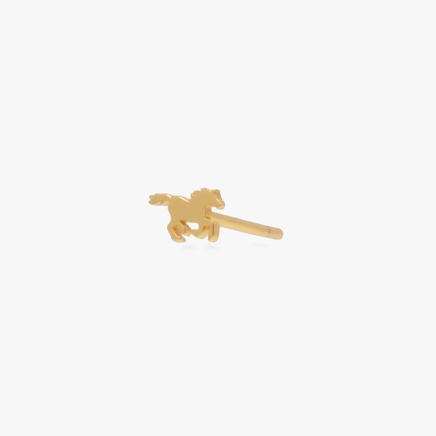 A small gold horse stud color:null|gold