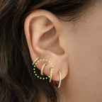 A 8mm gold/clear mini pave huggie [hover] color:null|gold/clear