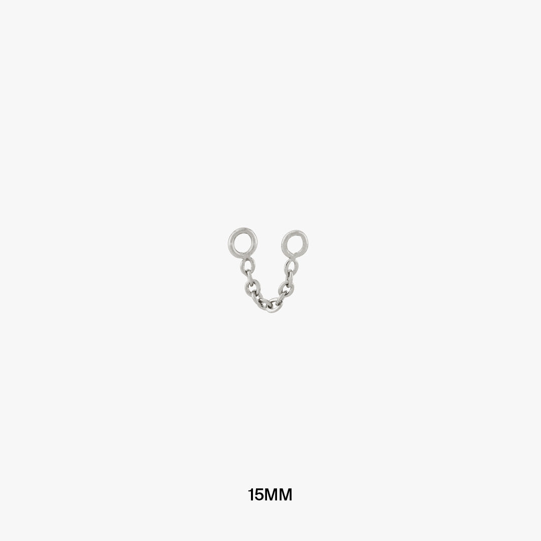 This is a thin silver chain that can be used to connect two earrings and measures 15mm color:null|15mm|15mm / silver