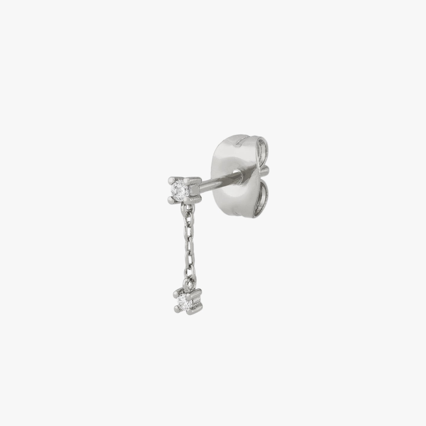 This is a small cz stud with a dangling cz connected by a silver chain color:null|silver/clear