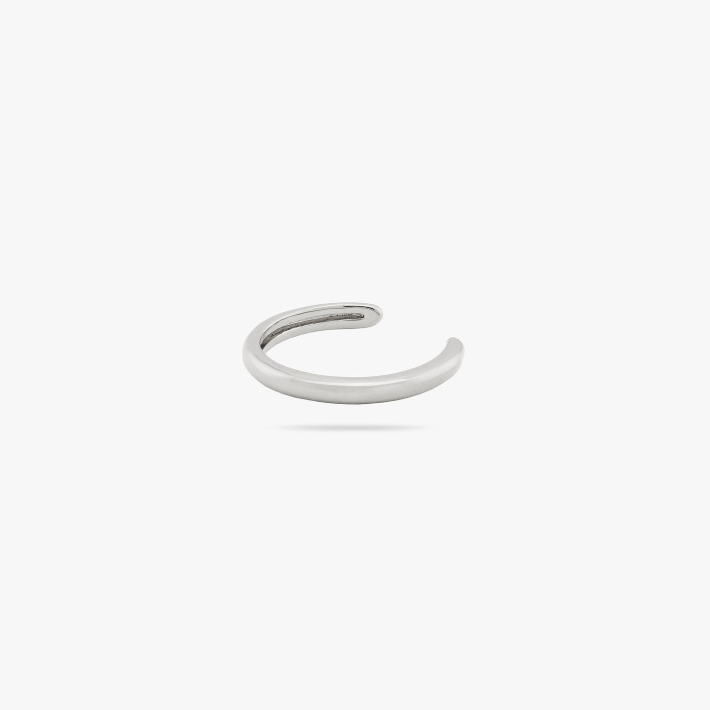 Slim silver ear cuff that requires no piercing. color:null|silver