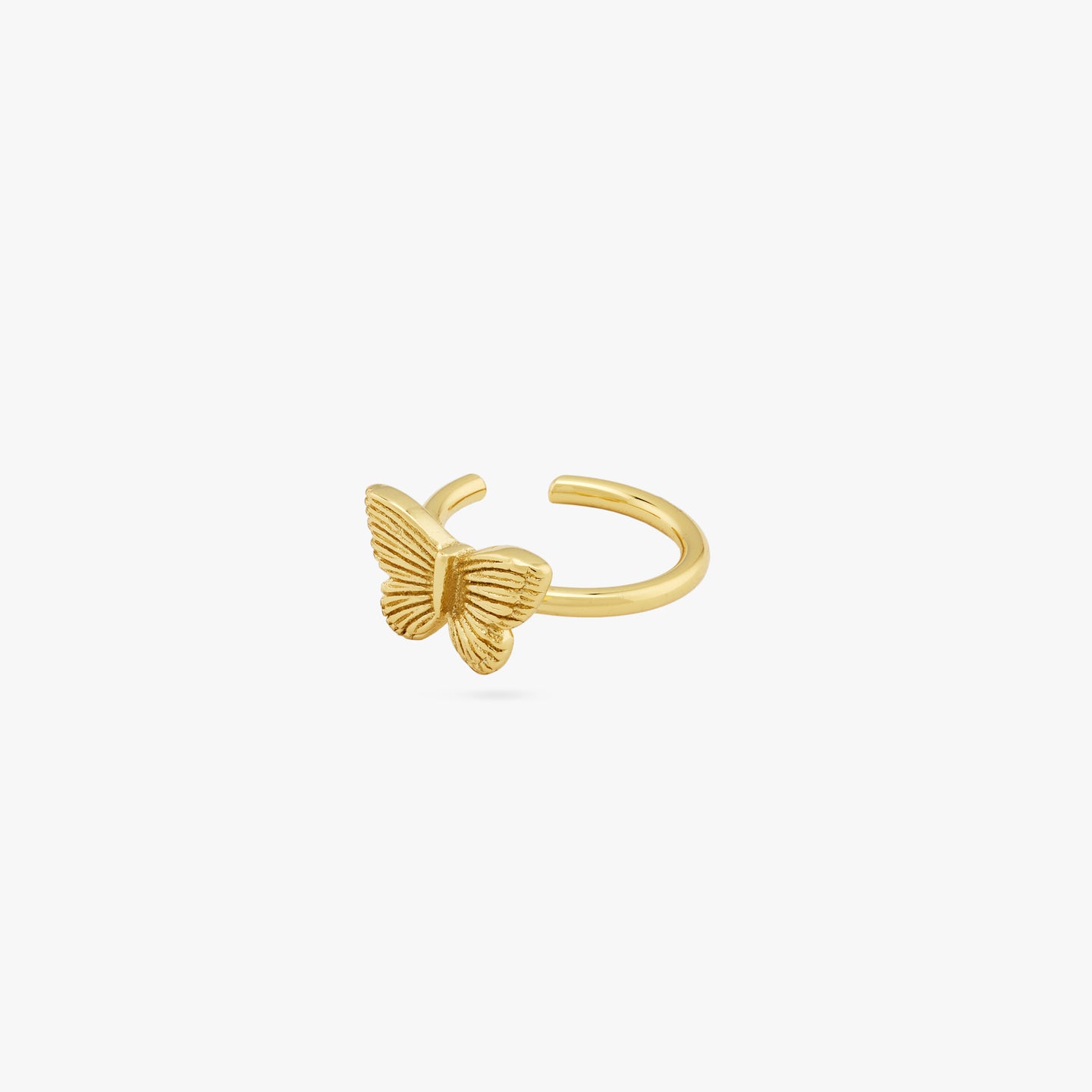 Gold butterfly cuff on ear. color:null|gold